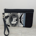 Load image into Gallery viewer, Cameo zippy clutch with detachable wristlet strap and credit card organizer.
