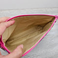 Load image into Gallery viewer, Light brown interior of magical disney treat zipper accessory pouch.
