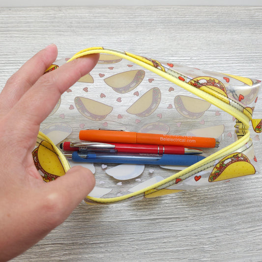 Clear taco boxy pencil pouch with zipper.