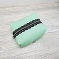 Load image into Gallery viewer, Mint green boxy pouch with black lace metal zipper.
