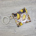 Load image into Gallery viewer, Mini clear taco zipper pouch for holding coins, cash or cards. 
