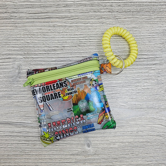 Mini clear vinyl magical parks zipper pouch wristlet. 