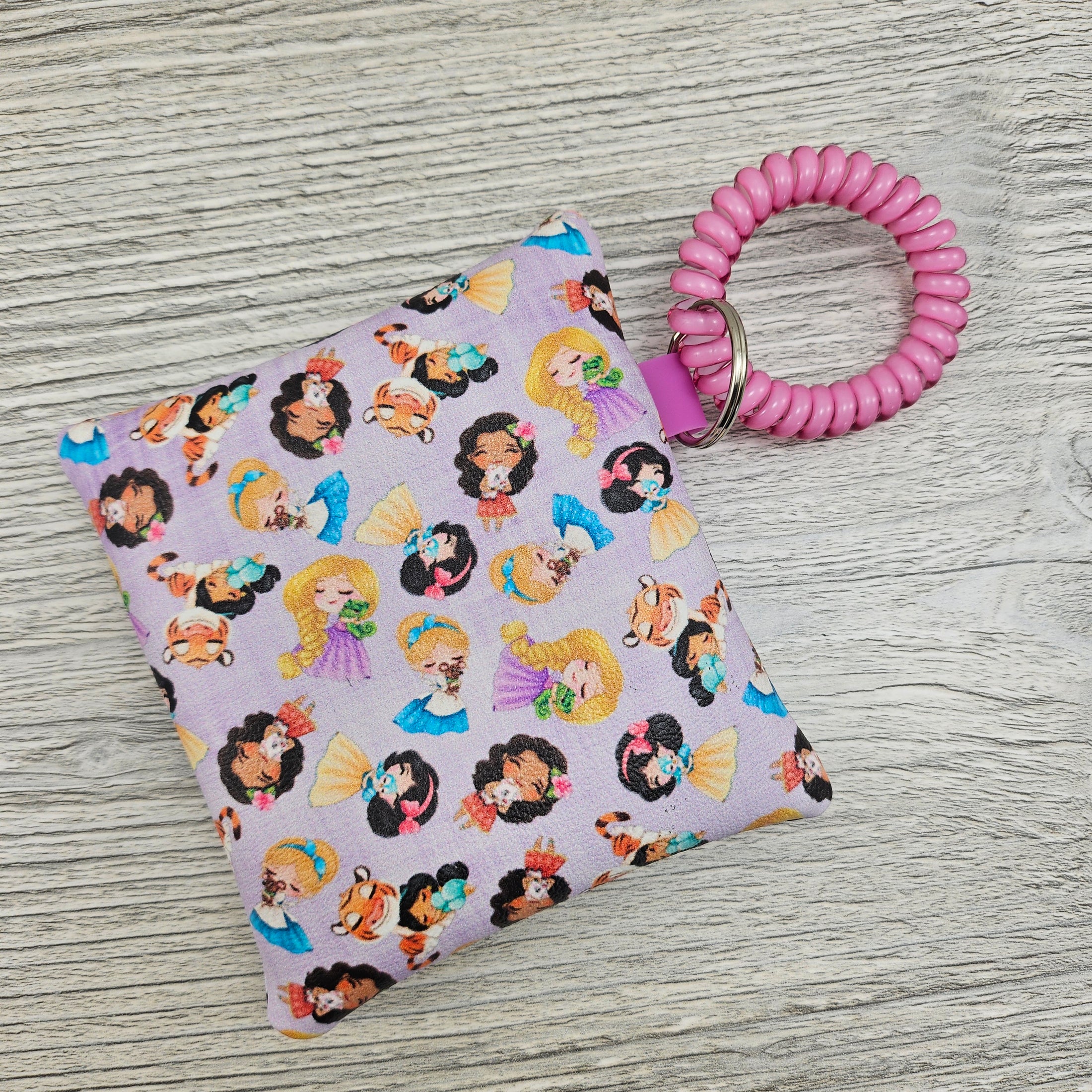 Mini disney princess inspired wristlet pouch for coins and cash. 