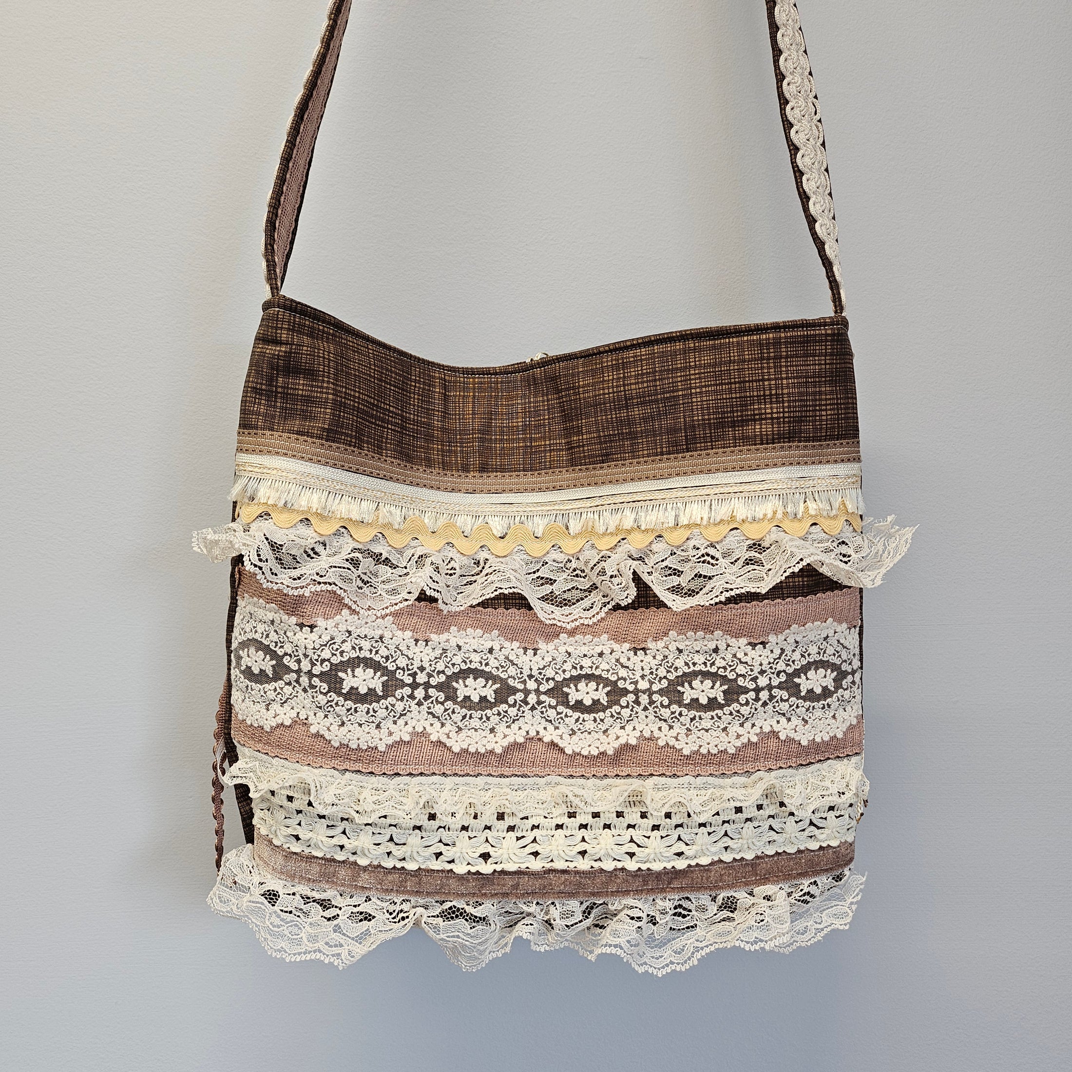 Bohemian lace trim embellished crossbody festival purse.