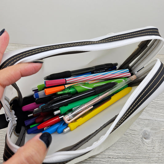 Black and white jelly vinyl school art bag.