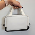 Load image into Gallery viewer, Black and white jelly vinyl carry all case.
