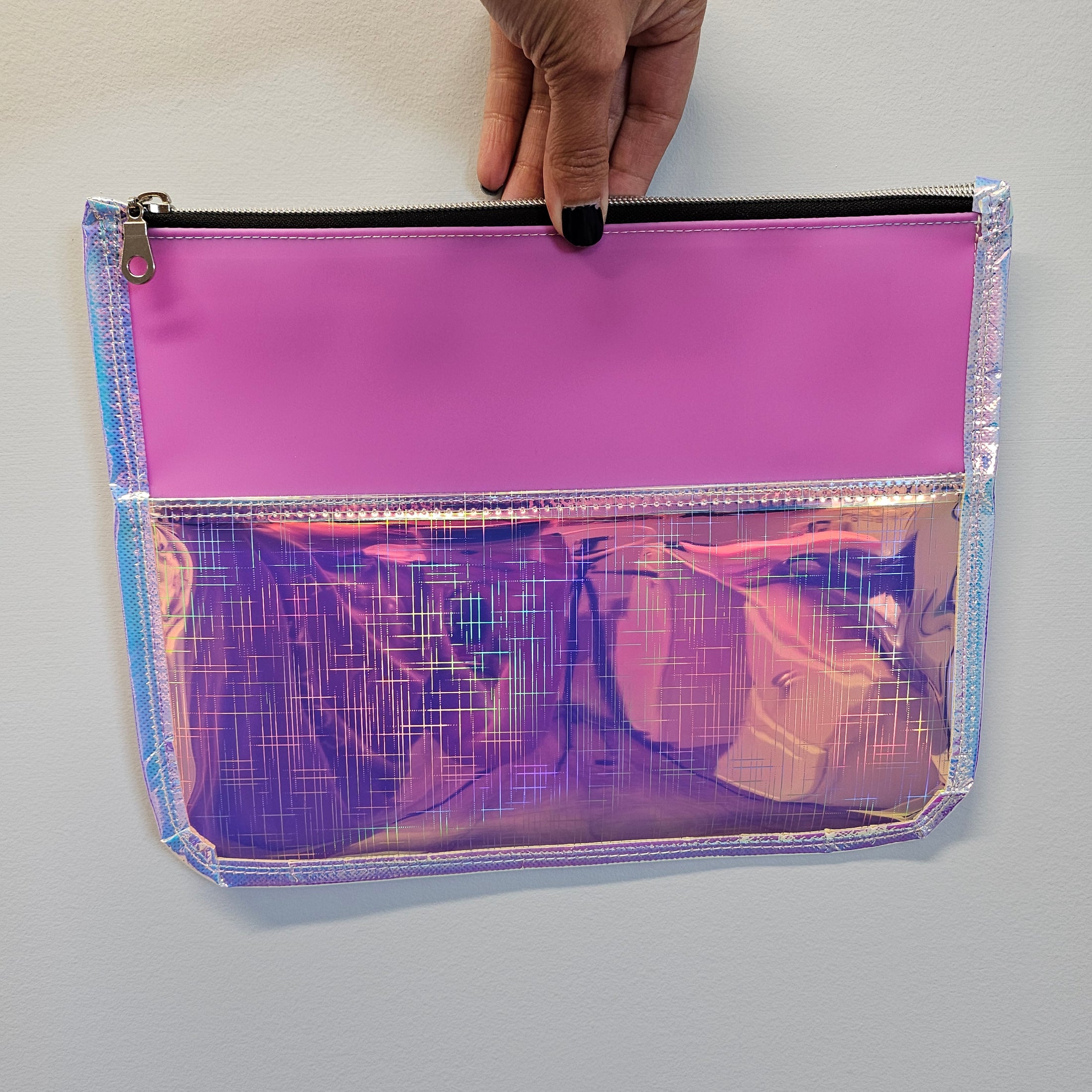 Transparent holographic pink large flat zipper pouch.