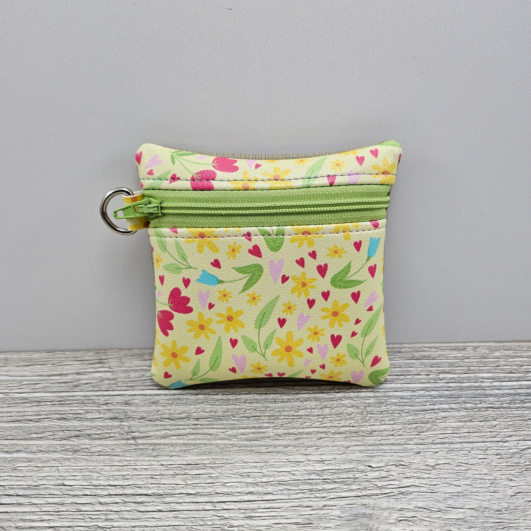 Mini spring time accessory zipper pouch.