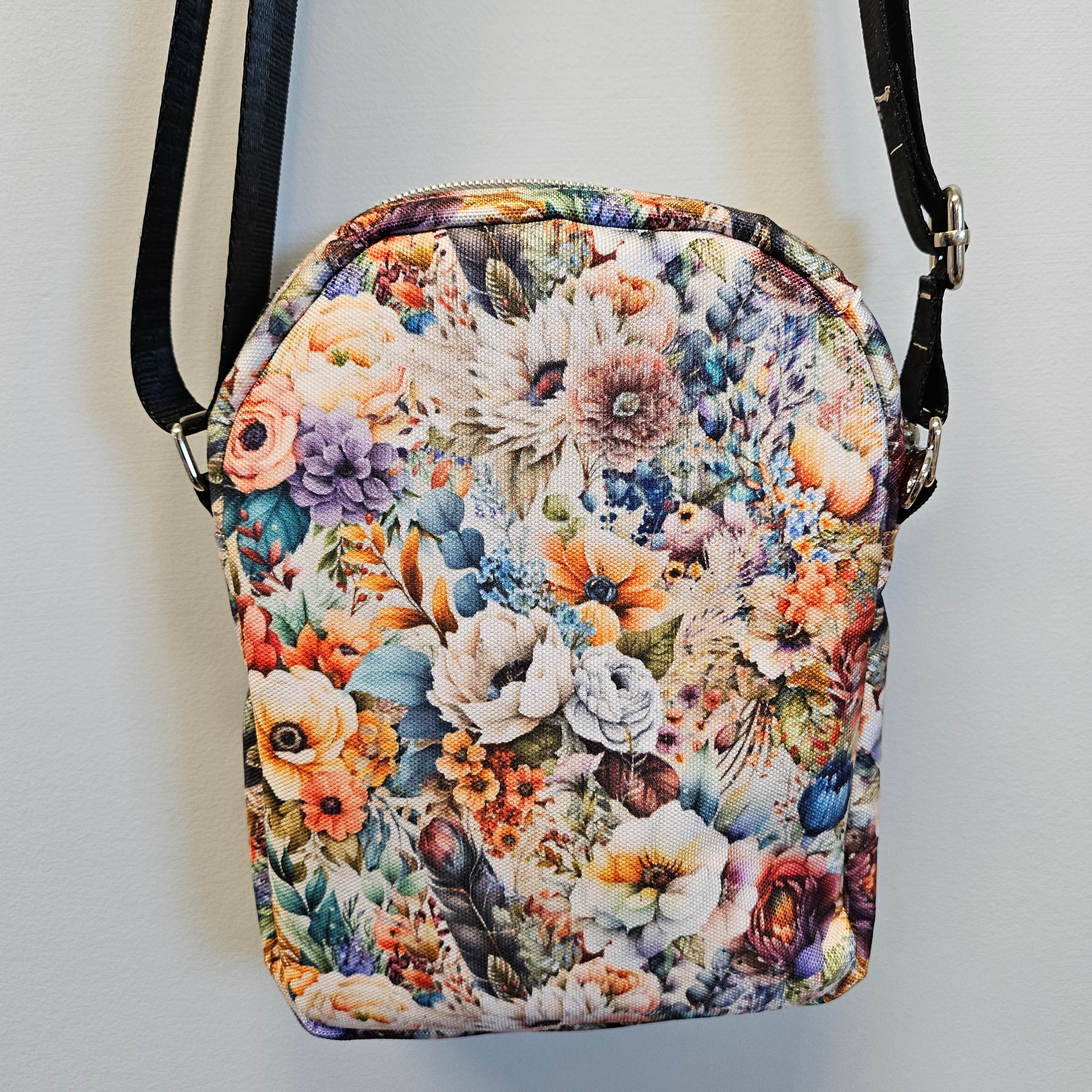 Fall floral crossbody shoulder bag.