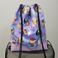 Load image into Gallery viewer, Back of The Little Mermaid drawstring backpack.
