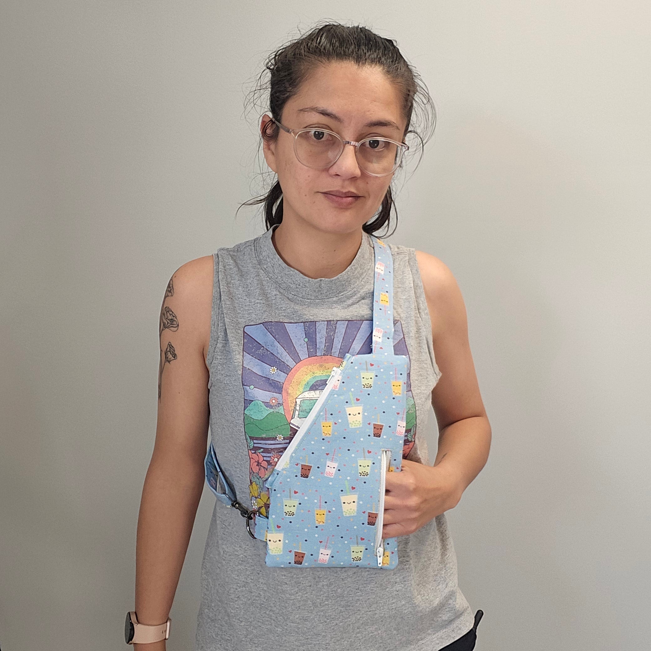 Person wearing the bubble tea sling traveler bag.