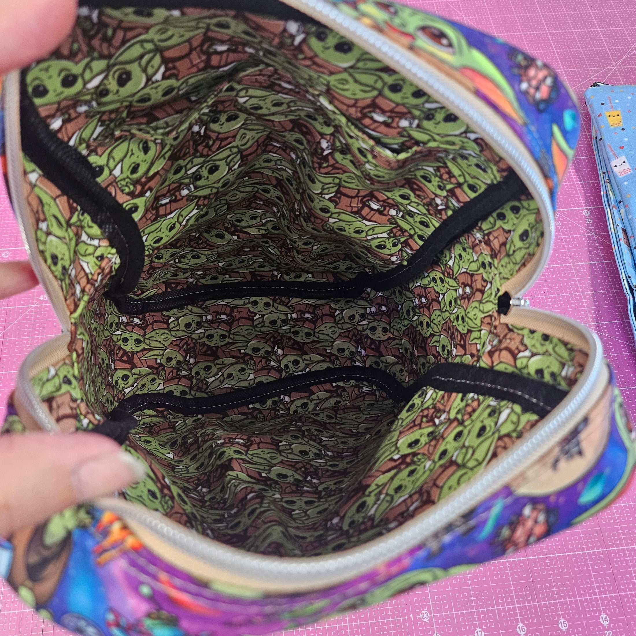 Main compartment of the grogu crossbody bag.
