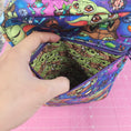 Load image into Gallery viewer, Front exterior zipper pocket on the grogu crossbody bag.
