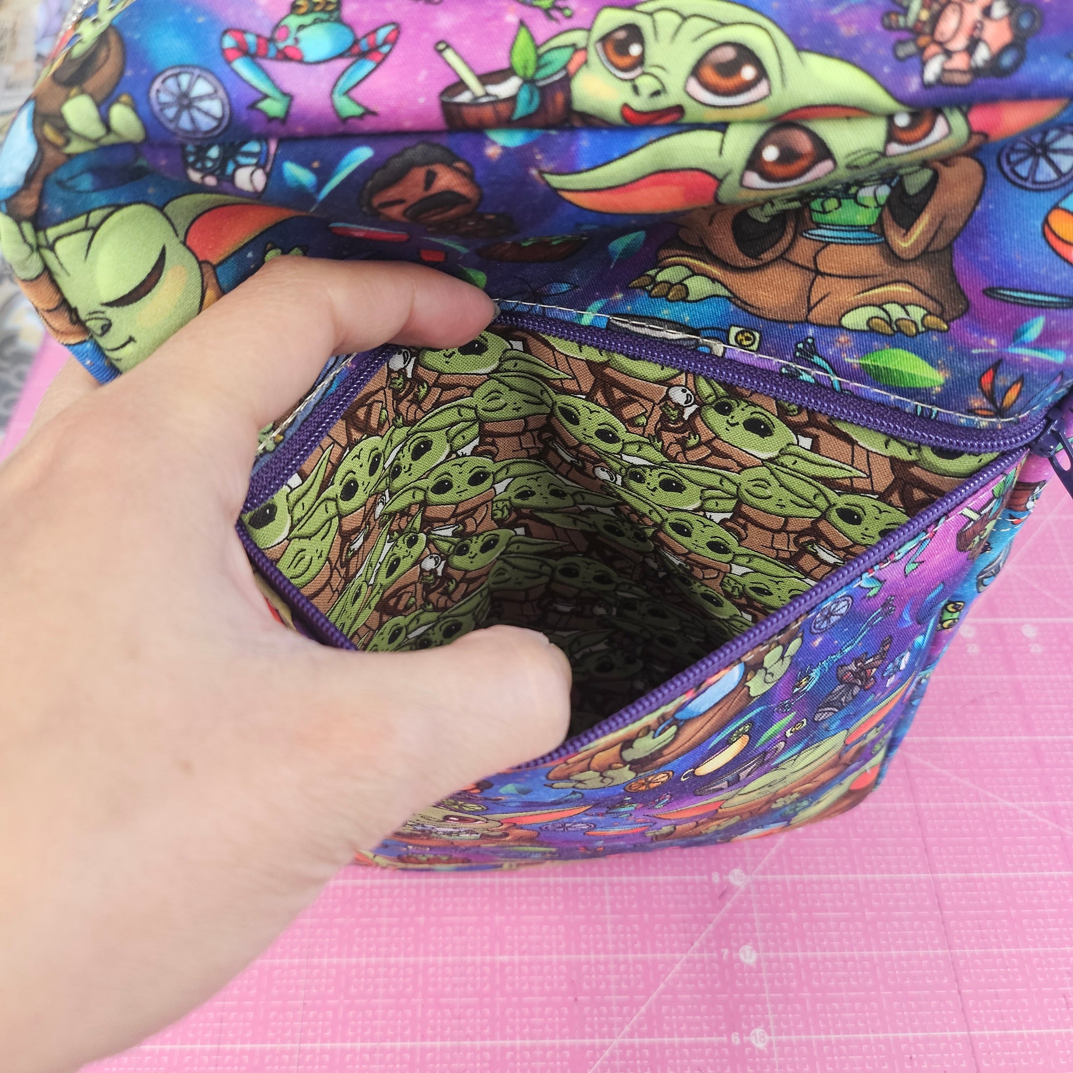 Front exterior zipper pocket on the grogu crossbody bag.
