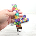 Load image into Gallery viewer, Autism awareness puzzle piece key fob.
