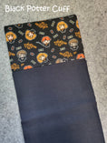 Load image into Gallery viewer, Black potter cuff halloween pillowcase.
