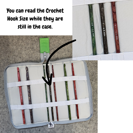 Crochet hook organizer case where you can see the sizes displayed on the crochet hooks.