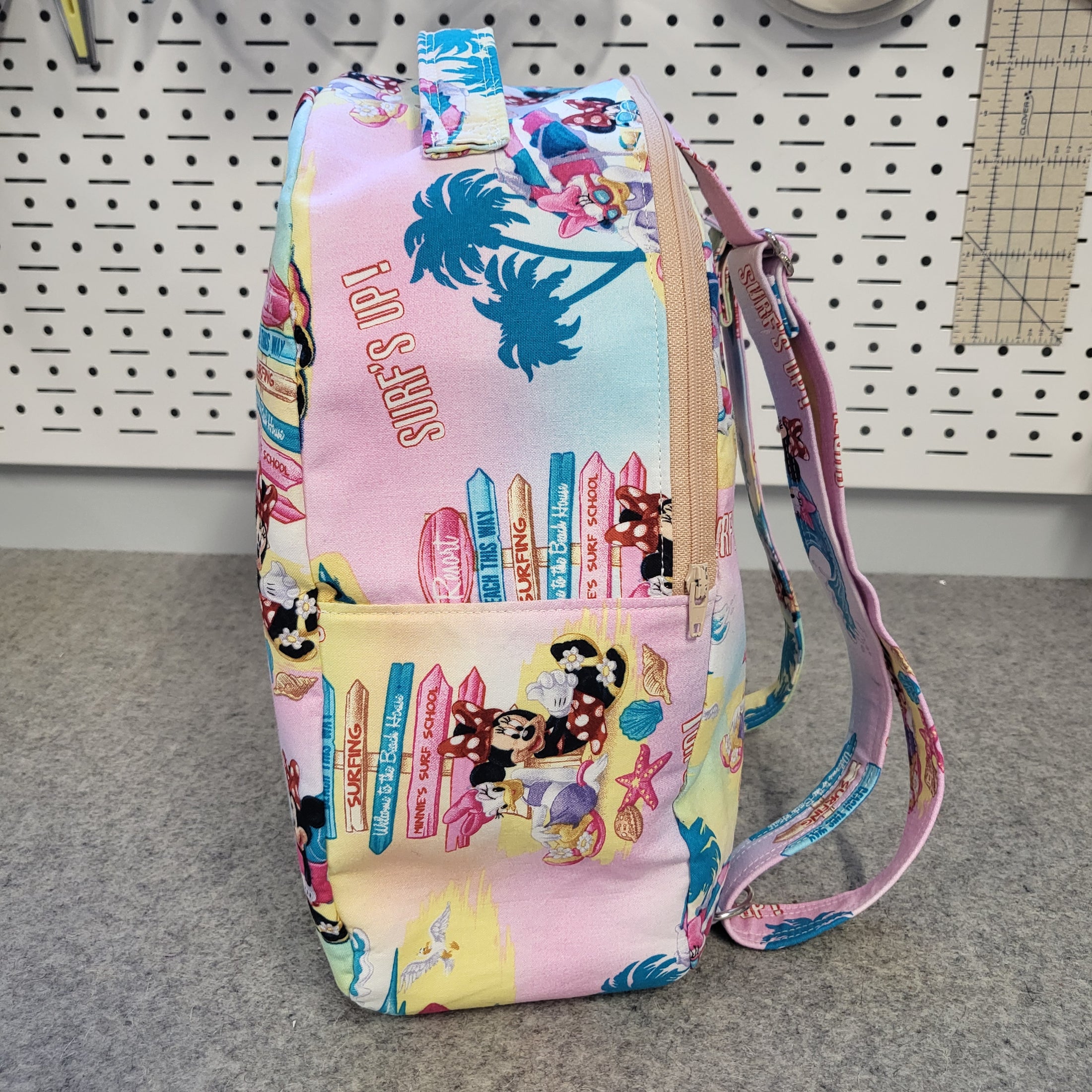 Fabric minnie and daisy mini backpack. 