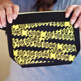 Load image into Gallery viewer, Keep your distance yellow tape zipper clutch.
