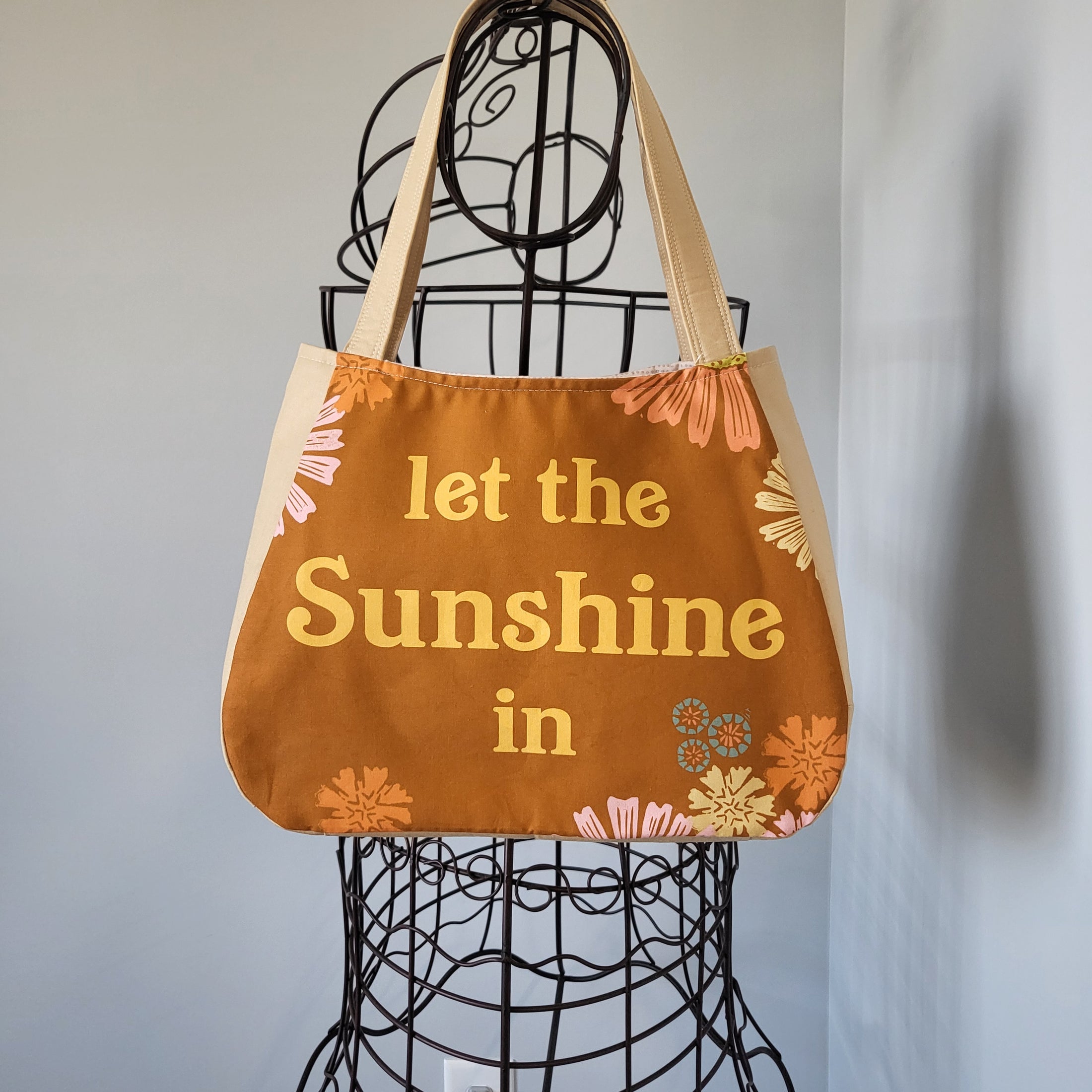 Let the sunshine in panel tote bag.