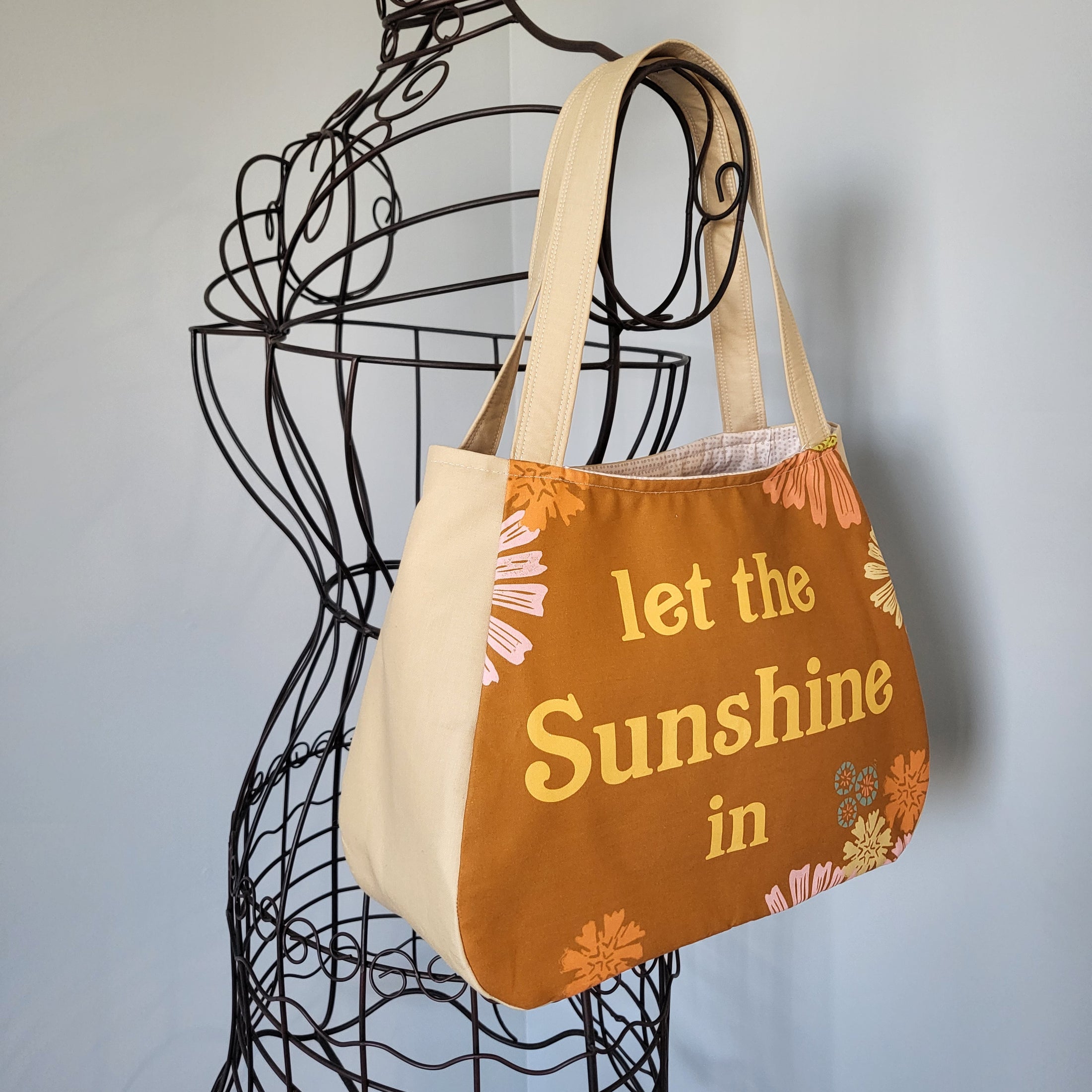 Let the sunshine in shoulder purse.