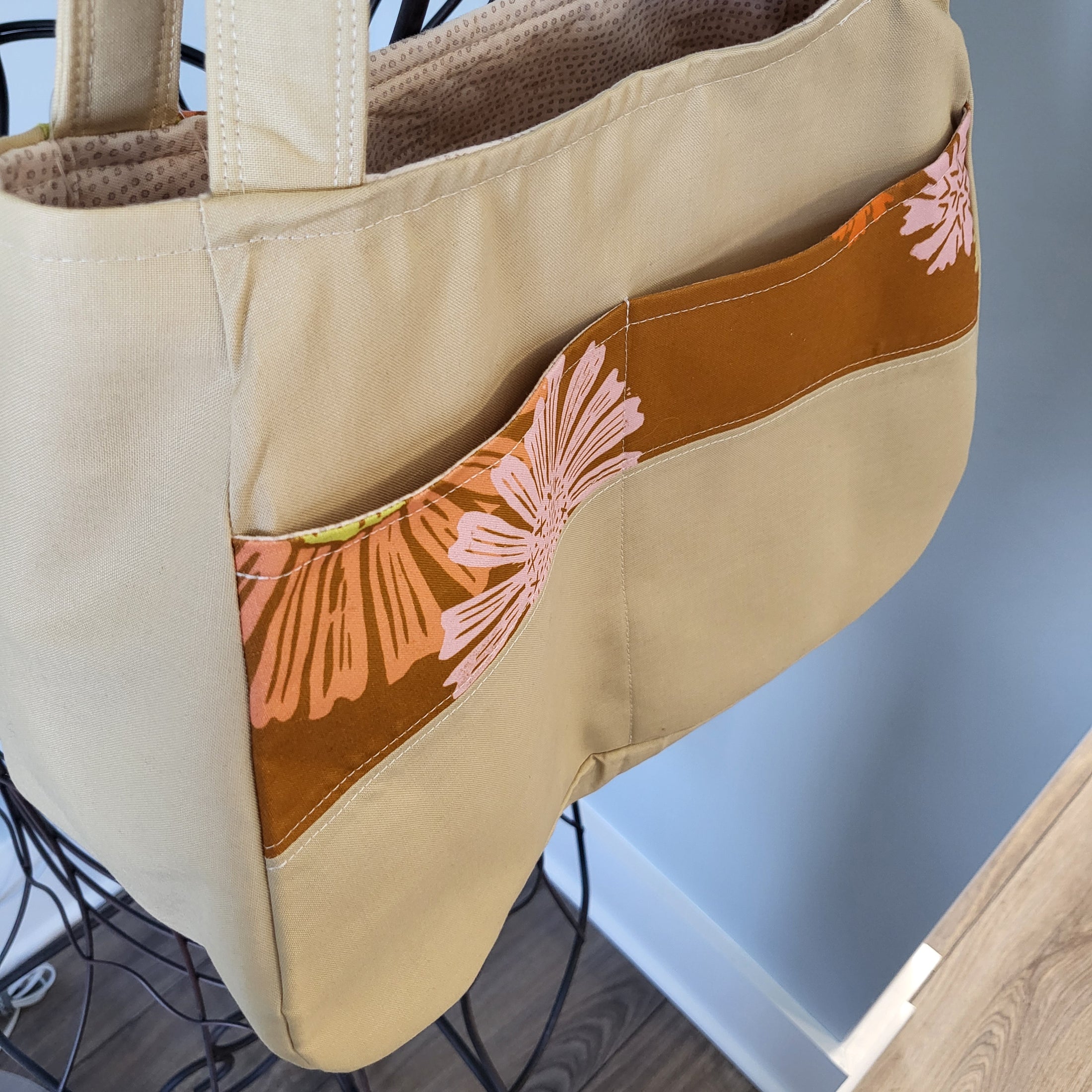 Let the sunshine in exterior pockets tote bag.