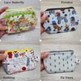 Load image into Gallery viewer, Assorted mini zipper pouches in different designs.
