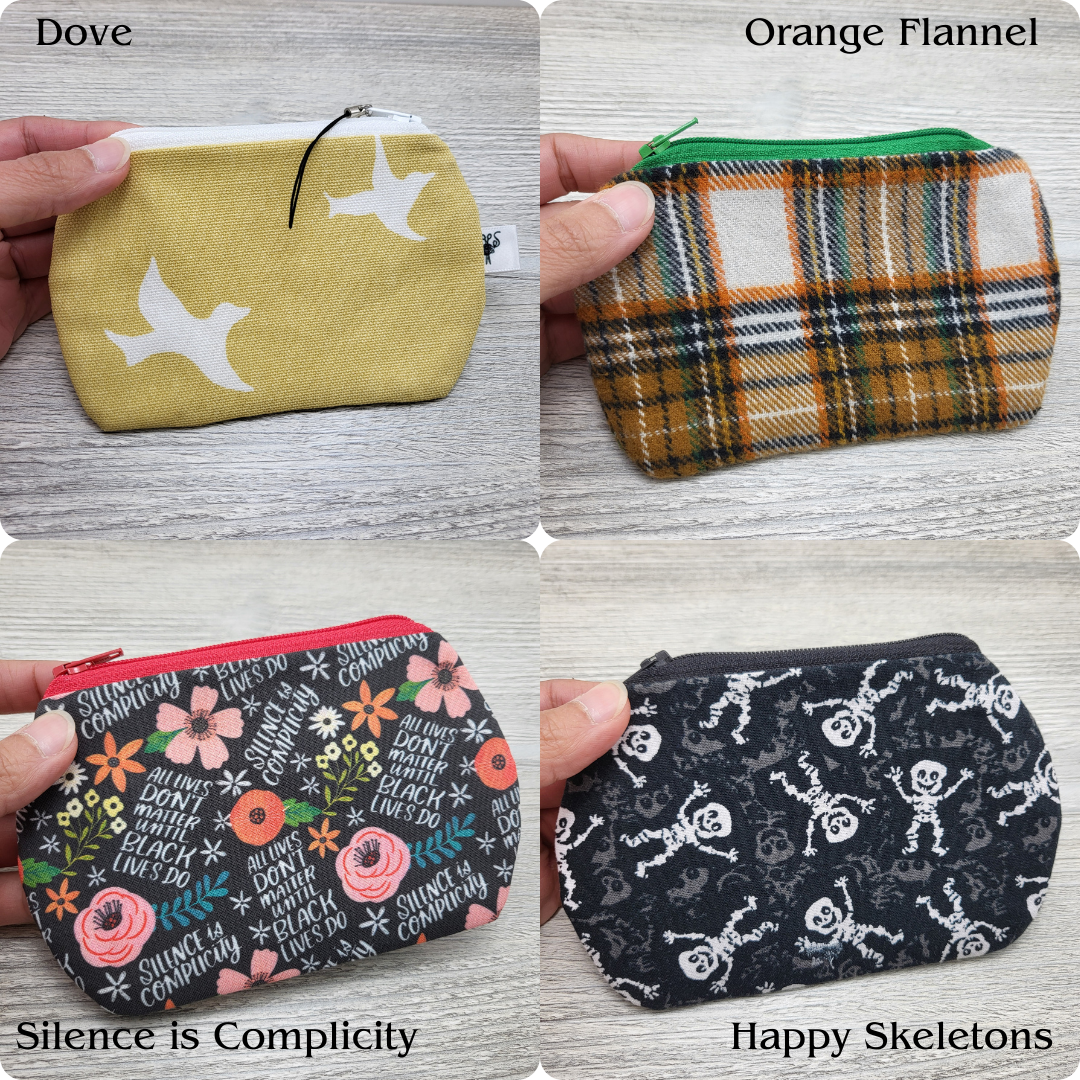Assorted gift card holders in different designs.