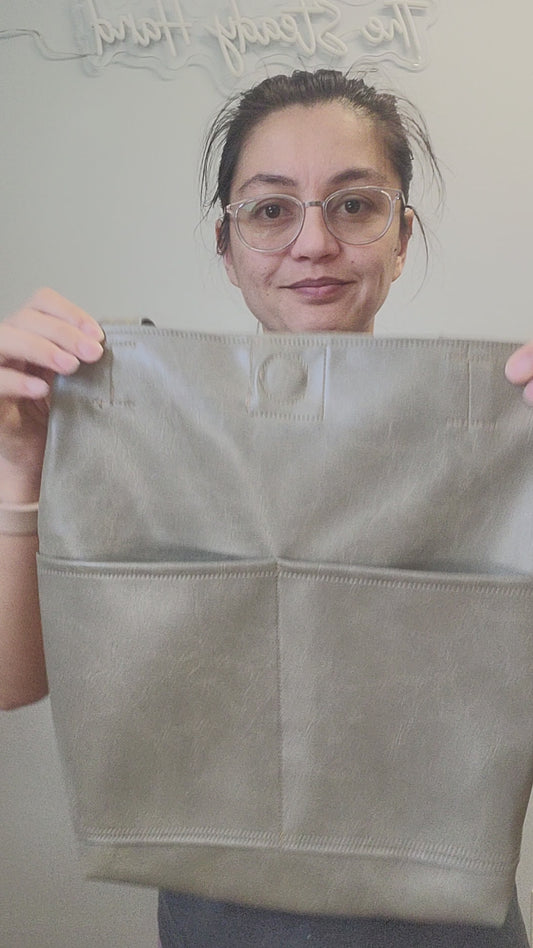 Video of brown vegan leather shoulder tote bag.