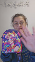 Load and play video in Gallery viewer, Video of the Sailor Moon inspired sling bag. 
