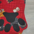 Load and play video in Gallery viewer, Video of paw print shaped holiday stocking for pets.
