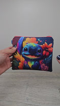 Load and play video in Gallery viewer, Video of the alien stitch zipper wallet. 
