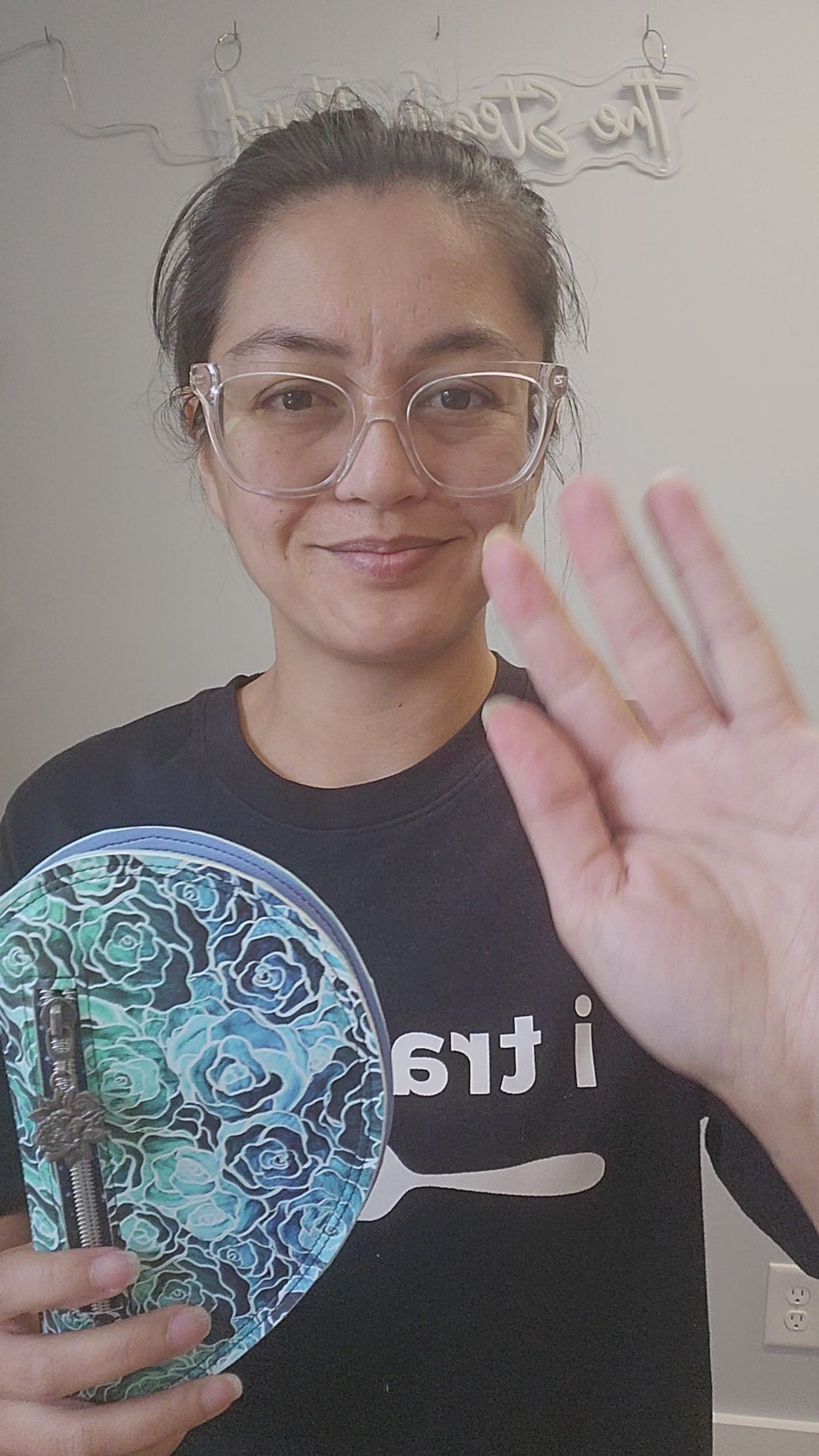 Video of a vegan leather heart shaped wallet.