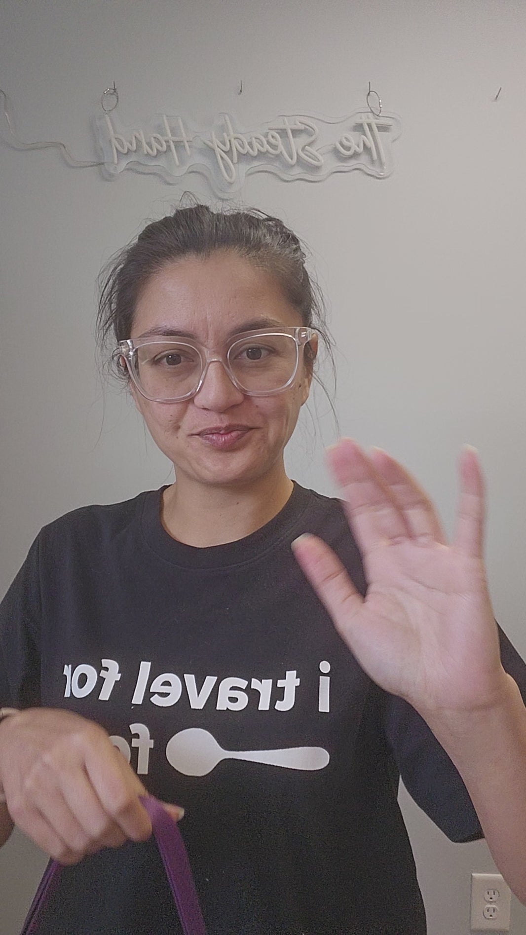 Video of purple crossbody bag with Disney characters.