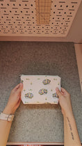 Load and play video in Gallery viewer, Video of the Porcupine flowers zipper pouch.
