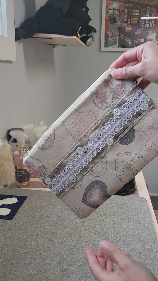 Video of the lace and hearts wristlet clutch.