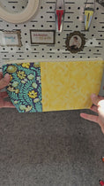 Load and play video in Gallery viewer, Video of bright floral flat bottom zipper pouch.
