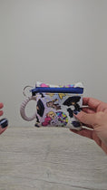 Load and play video in Gallery viewer, Video of the Wednesday Addams inspired mini wristlet.
