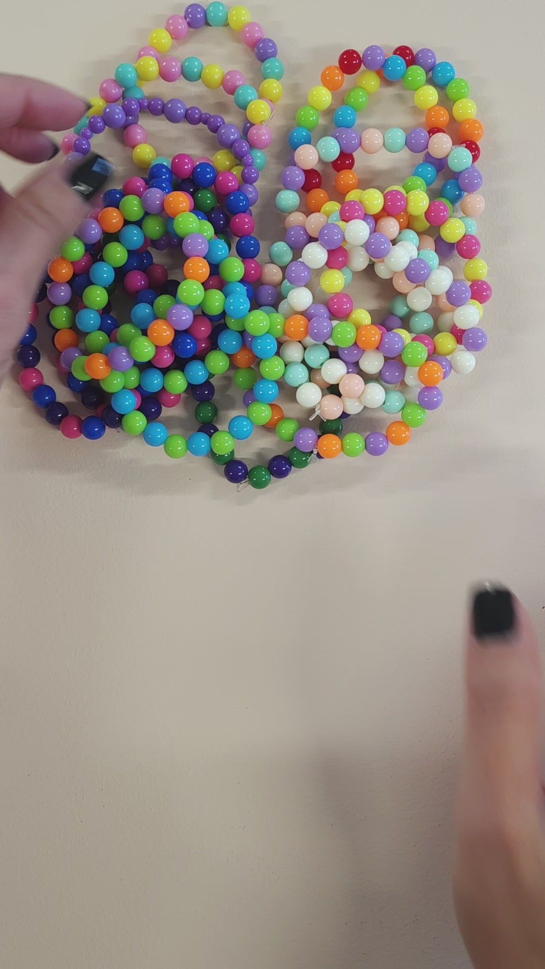 Video of the colorful ball bead stretch bracelets. 