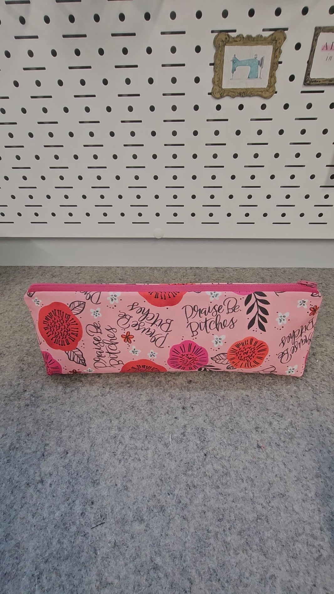 Video of the praise be bitches zipper pouch.