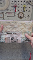 Load and play video in Gallery viewer, Video of lace quilted flat bottom zipper pouch.
