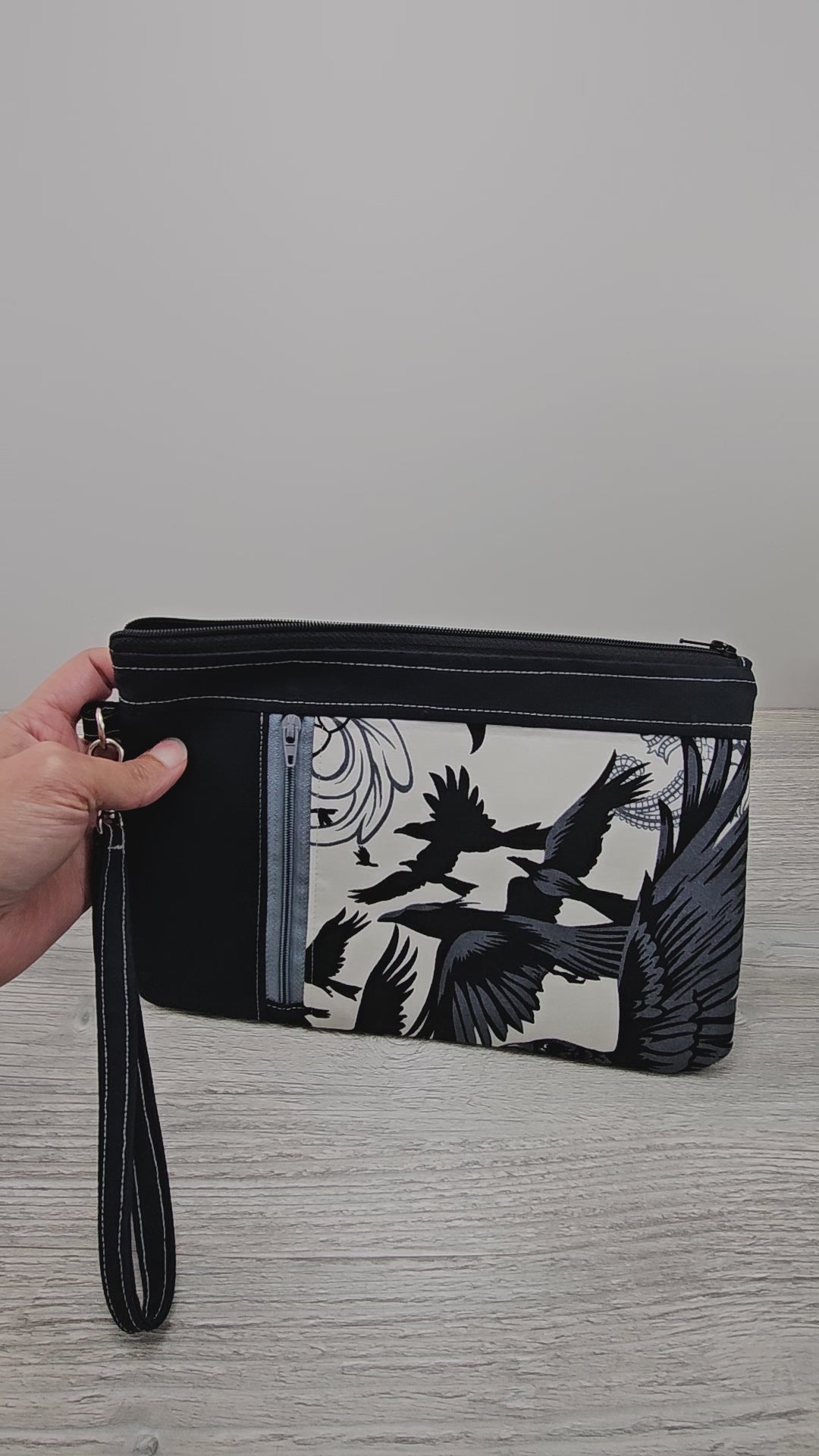 Video of the crows zippy clutch wristlet wallet.