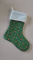 Load and play video in Gallery viewer, Video of quilted buddy the elf holiday stocking.
