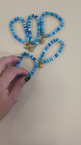 Load and play video in Gallery viewer, Video of the blue mix with starfish charm bracelets. 
