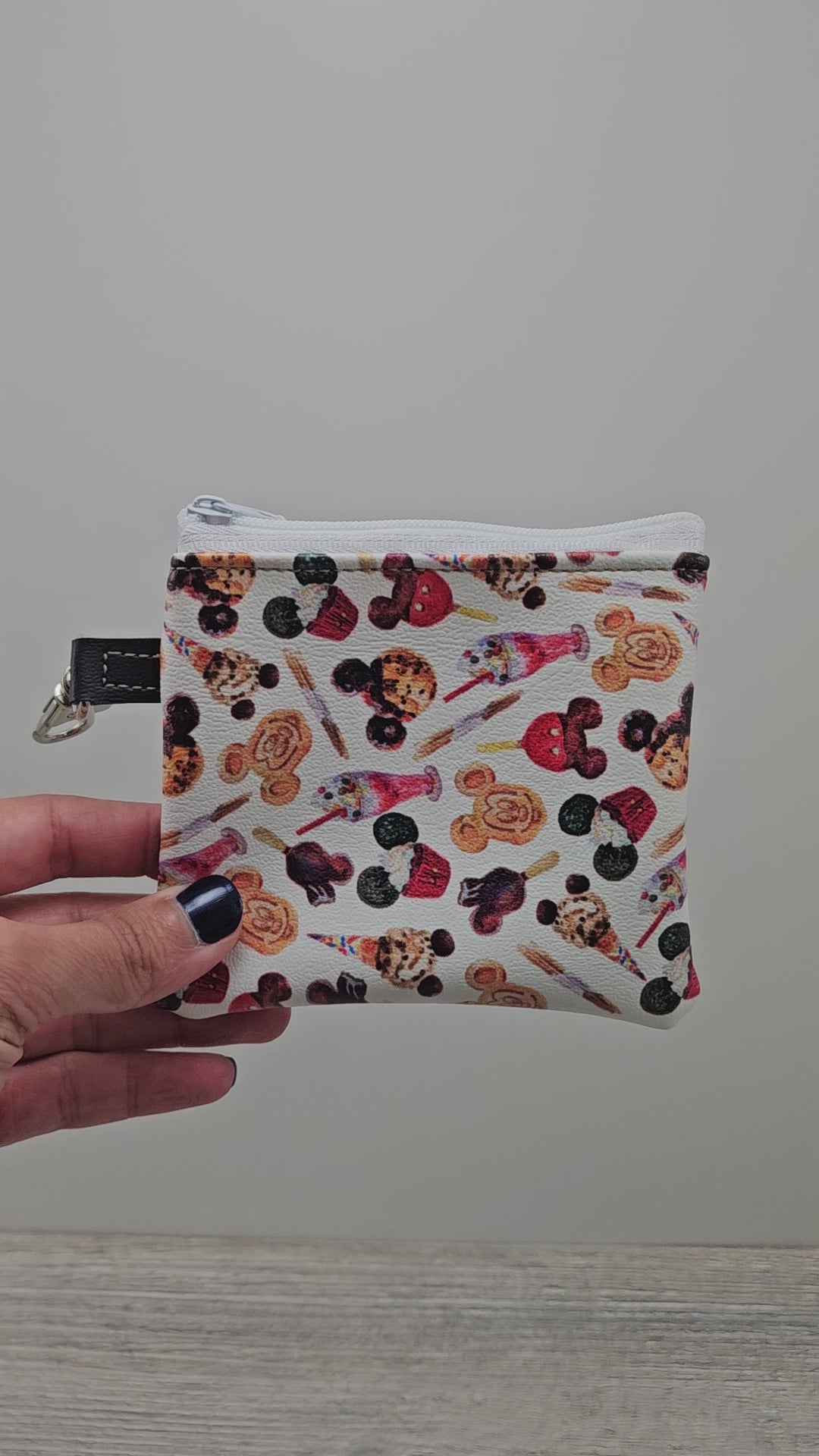 Video of the mini disney desserts zipper pouch.