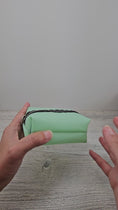 Load and play video in Gallery viewer, Video of mint green boxy pouch with black lace zipper.
