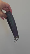 Load and play video in Gallery viewer, Short video of rainbow reflective key fob.
