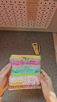 Load and play video in Gallery viewer, Video of the Watercolor lace zipper pouch embellished with white lace and green rick rack.
