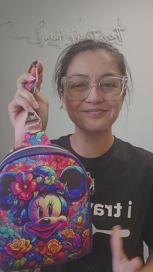 Video of a floral minnie mouse disney bag.