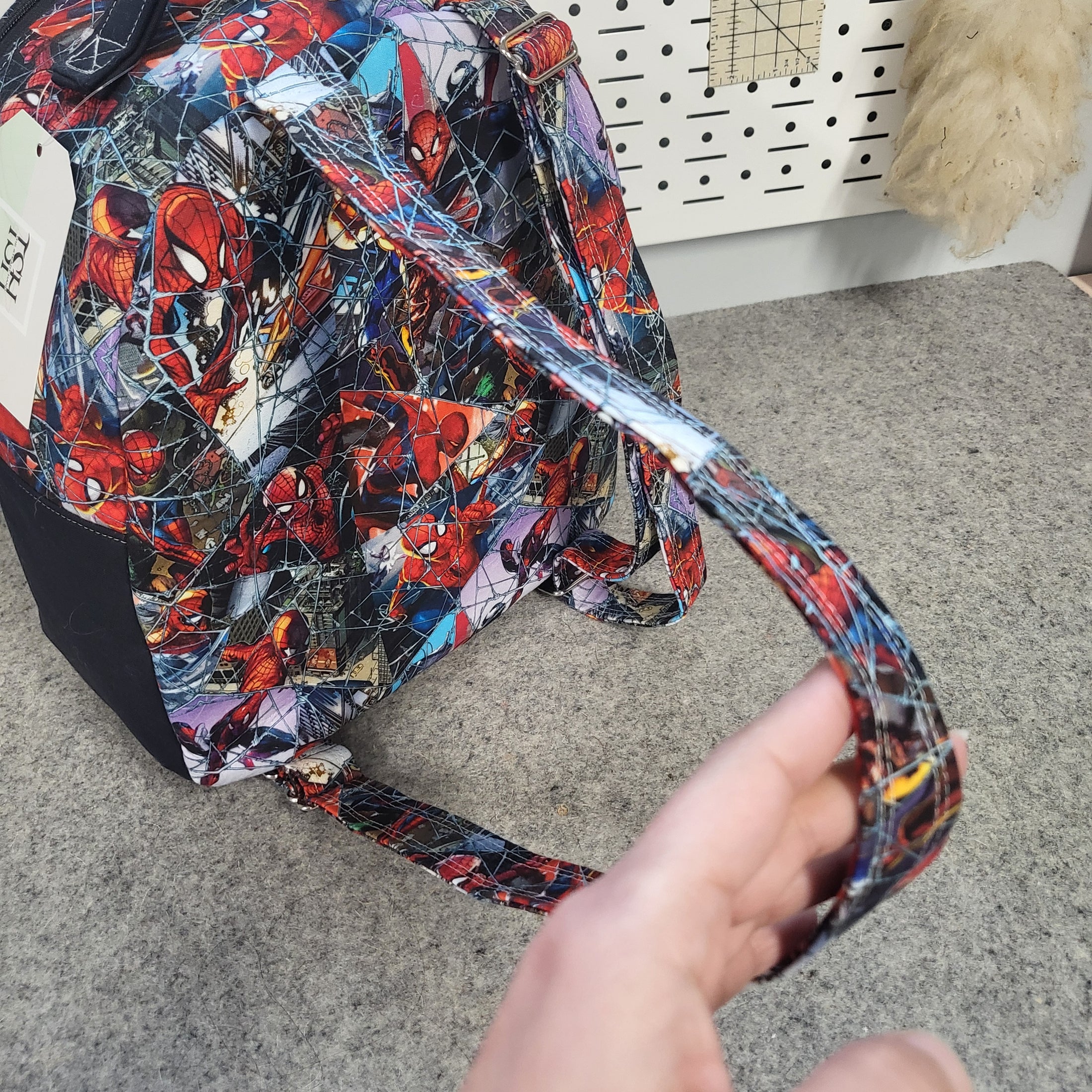Spiderman backpack strap.